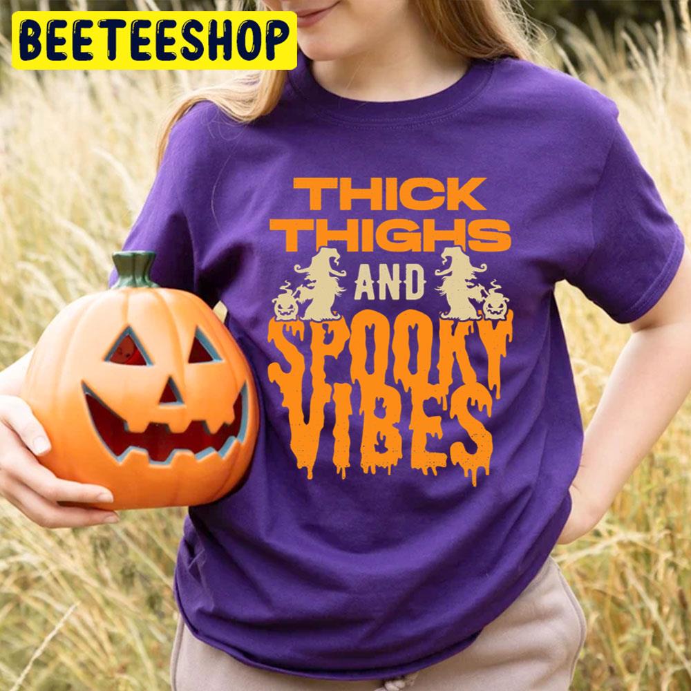 Witch And Pumpkin Thick Thighs And Spooky Vibes Halloween Trending Unisex T-Shirt