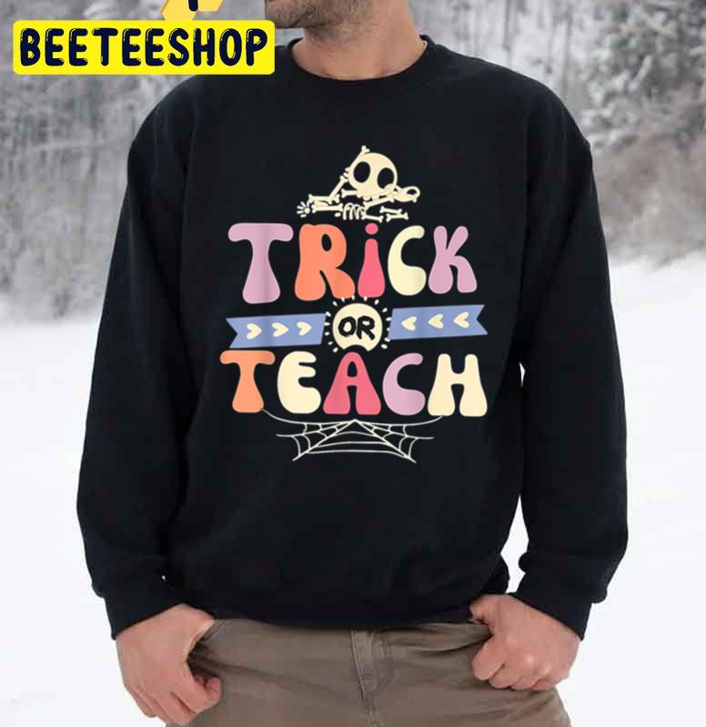 Trick Or Teach Groovy Halloween Teacher Unisex Sweatshirt