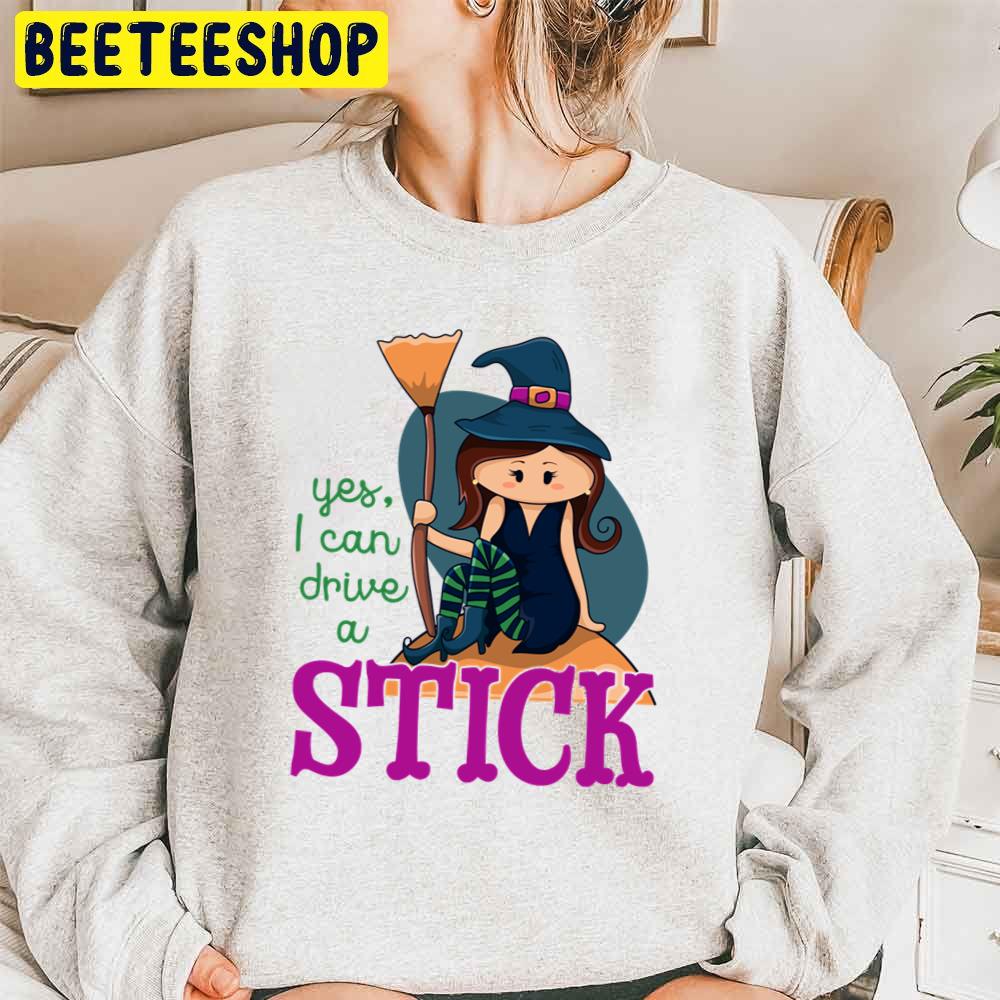 Yes I Can Drive A Stick Cute Illustrated Witch Sitting Holding A Broom Funny Halloween Trending Unisex Sweatshirt