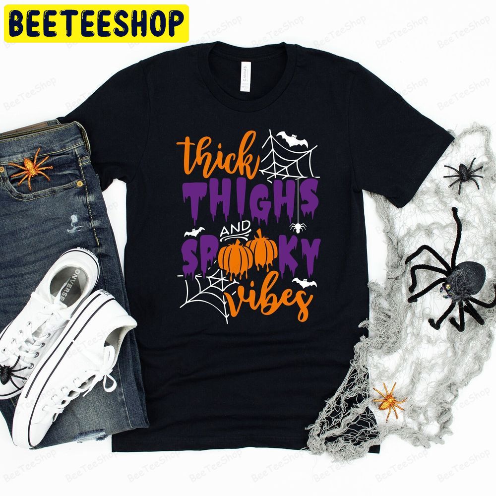 Thick Thighs And Spooky Vibes Halloween Pumpkin Trending Unisex T-Shirt